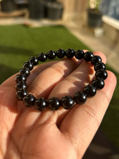 “Natural Black Obsidian Crystal for Protection and Grounding – qodeshop.com”