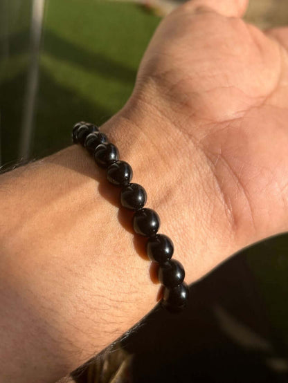 “Natural Black Obsidian Crystal for Protection and Grounding – qodeshop.com”