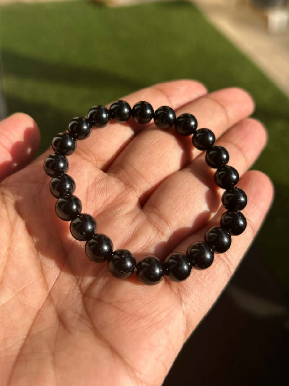 “Natural Black Obsidian Crystal for Protection and Grounding – qodeshop.com”